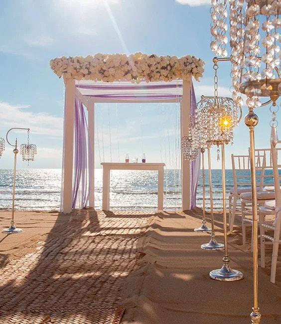 Beach wedding ceremony decor at Marival Resorts