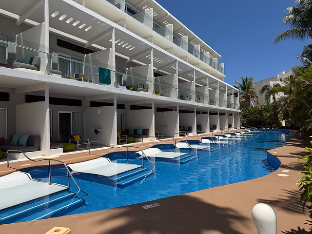 Swim-up suites along a resort pool